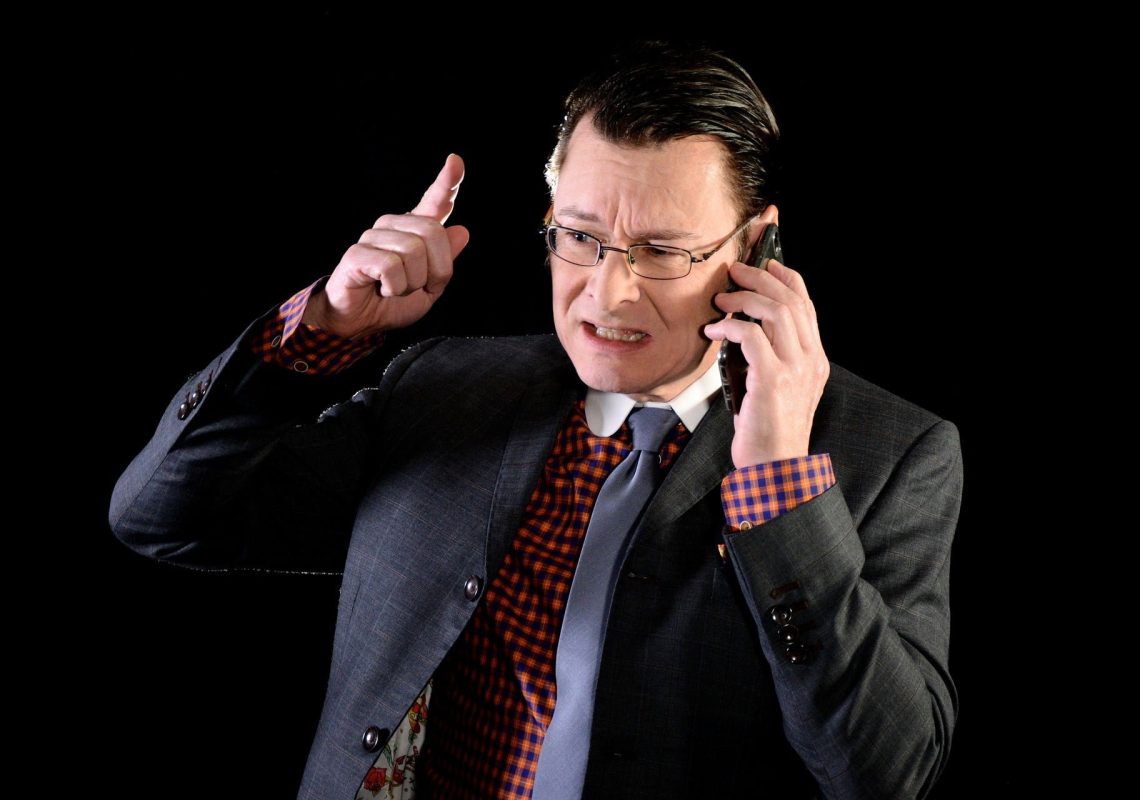 CFA Training | Frustrated businessman making a phone call